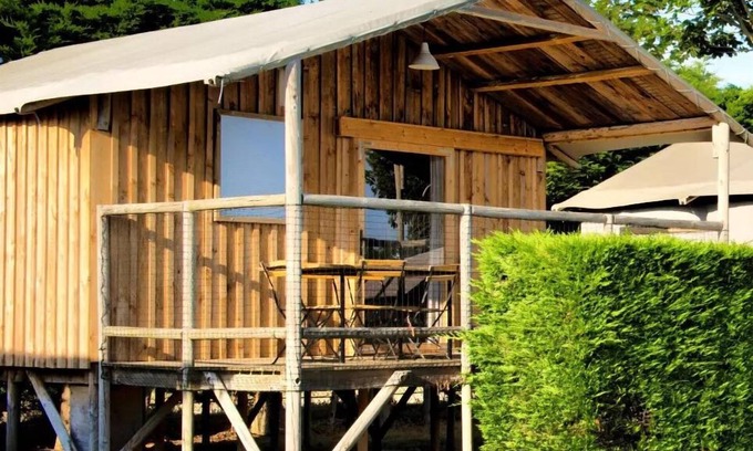 Treignac House | Flower Camping La Plage * - Cabane Lodge Bois sur Pilotis Standard 34m2 (2 bedrooms) including covered terrace 11m2 4 people