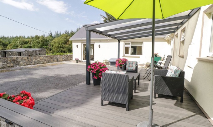 Milltown Cottage | FOREST HOUSE, romantic, with open fire in Tuam, County Galway