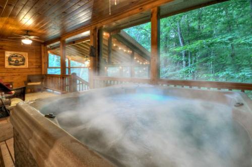 Blue Ridge Villa | Four Seasons Wood-burning fireplace cozy hot tub comfy beds