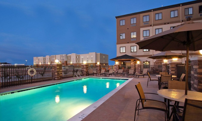 Odessa Condo | Free Breakfast. Outdoor Pool. Gym. Close to the University of Texas Permian Basin!