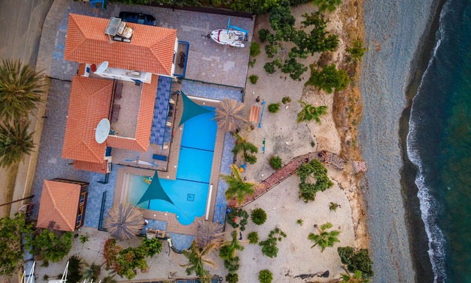 Pomos Villa | Front beach 3 bedrooms VIlla, huge heated swimming pool 15X5X10 meters L shape