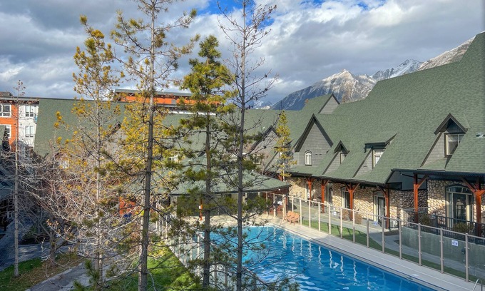 Canmore House | Full Mountain Chalet facing HEATED POOL and HOT TUB!