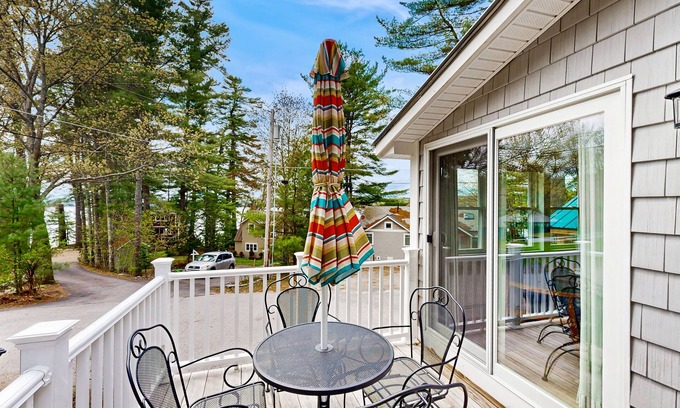 Harrison House | Fully renovated home with lake view, dock & mooring access, kayaks, & deck
