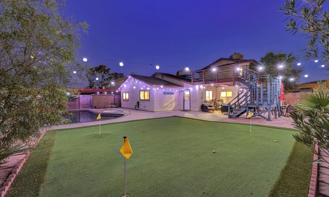 Chinatown House | Fun five bedroom home by the strip. pool, putting green, games, karaoke!