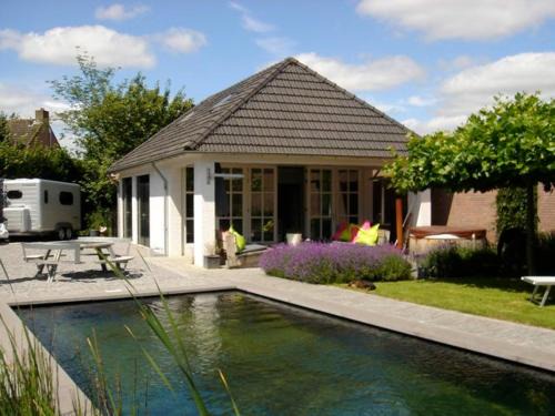 Teteringen Ski Chalet | Gardenhouse with private jacuzzi & private sauna