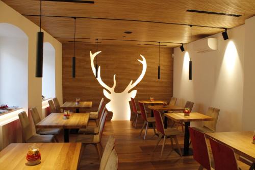 Magre sulla Strada del Vino Hotel | Gasthof Zum Hirschen Margreid