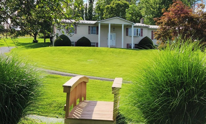 Muncy House | Glade Run House - A quiet country home retreat with a stream running through it.