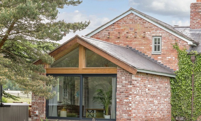 Hendrerwydd Cottage | GLAN CLWYD ISA - THE BIG BARN, pet friendly, with pool in Denbigh