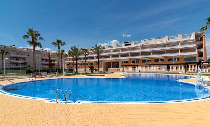 Playa de Almarda Apartment | Global Properties: Ground floor with pool in Almenara