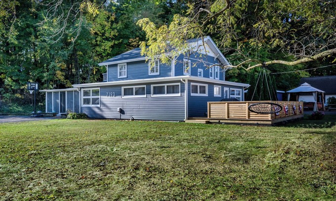 Paw Paw Lake House | Golf, Fish, Boat, Relax, Repeat! 4-bed, 2-bath house steps away from the lake.