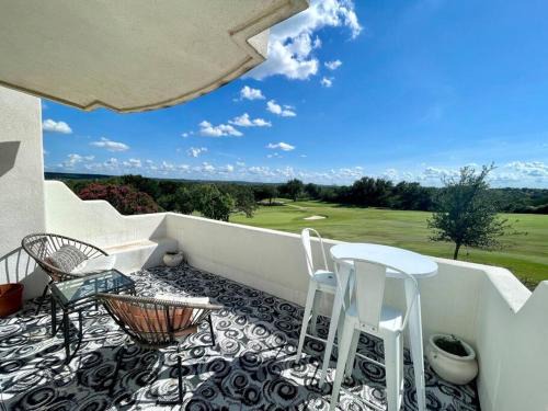 Horseshoe Bay West Villa | Golf Front Hill Country Villa by Famous Architect