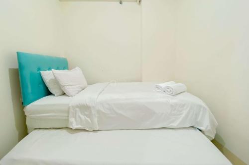 Rawasari Apartment | Good Choice and Homey 2BR at Green Pramuka City Apartment By Travelio
