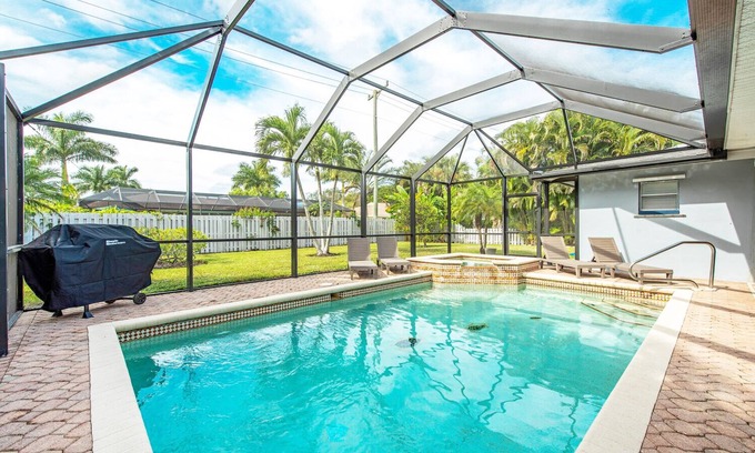 Palm River Estates House | Gorgeous Heated Pool and Hot Tub Home!