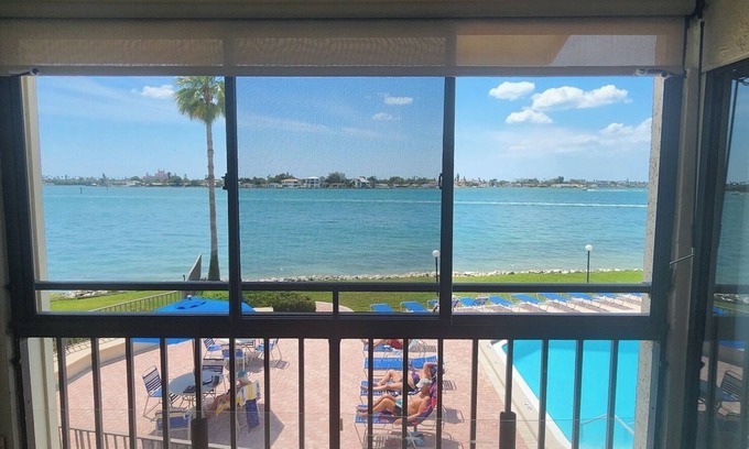 Casa del Mar Condo | Gorgeous Second Floor Waterfront Villa with Sunset views over Boca Ciega Bay!
