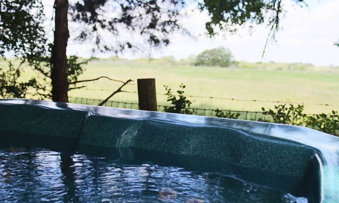 Brenham House | Grand Spa features Private Hot Tub, Shuffle Board, Disco Ball at Scenic Hill Retreat