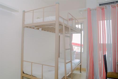 Pluit Apartment | Green Bay Pluit Studio Apartment with 2 Single Beds By Travelio