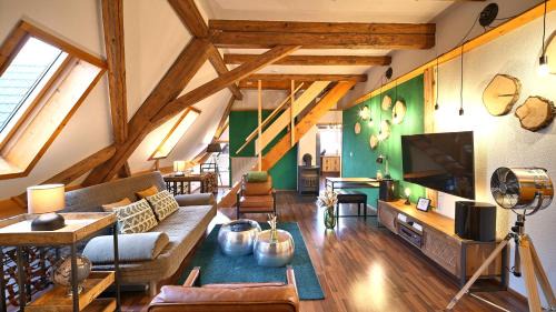 Fluorn Apartment | Green Loft Schwarzwald - Dach-Balkon-Musik-Ecke