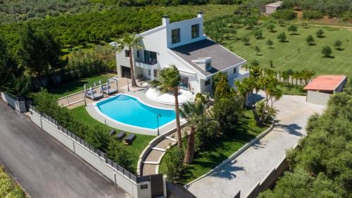 Vamvakopoulo Villa | Gregorys Luxury Villa Chania Crete Heated Pool 18m 2000m2 Garden Ideal for Families and Events