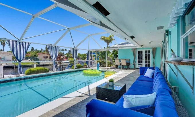 Coral Ridge Isles Villa | Heated Pool~Waterfront 4BD Villa~Deck~BBQ