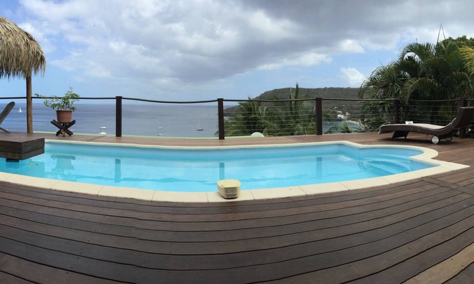 Les Anses-d'Arlets Villa | Heavenly setting, view of the Caribbean Sea, swimming pool and large shaded terrace.