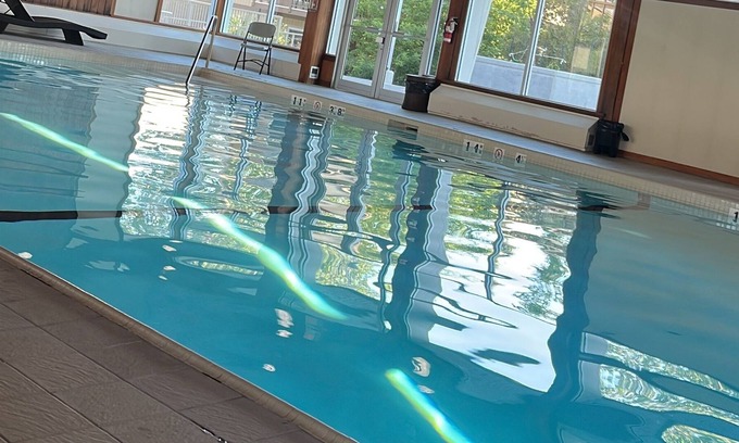 Southwest Calgary Condo | Hello to Garden, our Huge Apartment With Pool