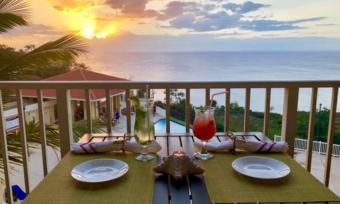 Borinquen Condo | High atop the BLUFF Overlooking Spectacular Ocean View of Crashboat Beach at PDM