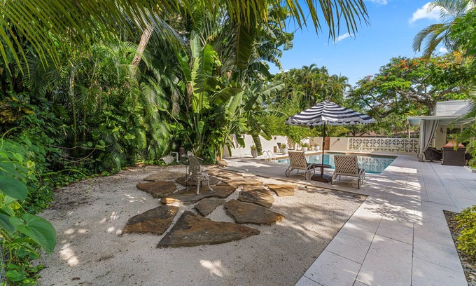 Valencia Terrace House | Historic 1920's spanish-style home just off Palm tree lined McGregor Blvd