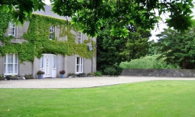 Oughterard House | Historic Georgian Country House with Private Garden & Riverside Charm