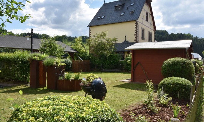 Dhronecken Apartment | Holiday apartment "Falkennest" - living in a listed roof structure