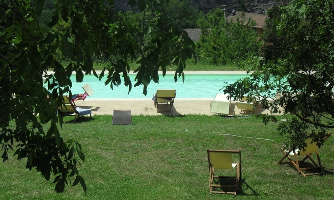 Lizzano in Belvedere House | Holiday Home in Imola with Forest & Pool