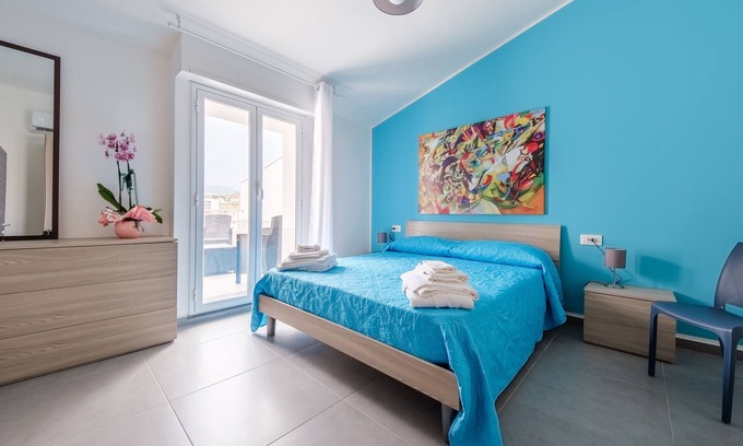 Fondachello House | Holiday Home 'Alba's Home - Kandinsky' with Private Terrace, Wi-Fi and Air Conditioning
