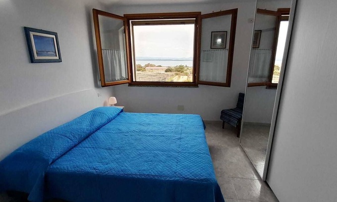 Calasetta House | Holiday Home 'Cri' with Sea View, Private Terrace and Air Conditioning
