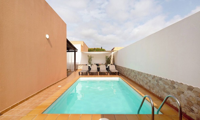 Corralejo House | Holiday Home “El Cortijo” with Terrace, Pool & Wi-Fi