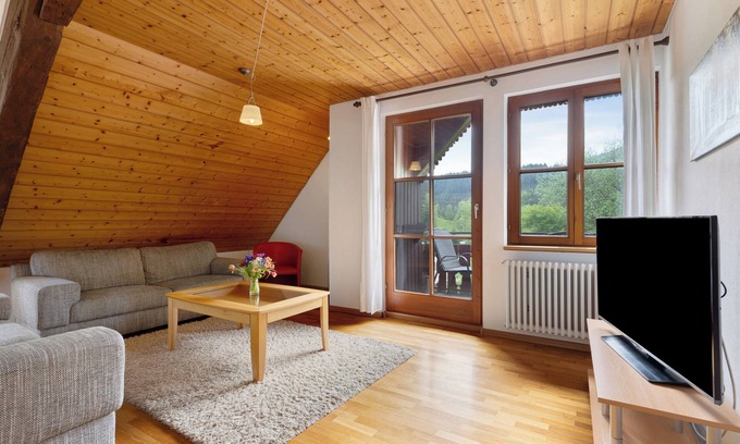 Schenkenzell House | Holiday Home 'Haus 2 Hanselishof - 2 Wohnungen' with Mountain View, Shared Garden and Wi-Fi