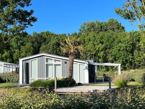 Wemeldinge House | Holiday Home in Zeeland with Streamside Terrace