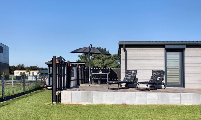 Seeland House | Holiday Home 'Madera Concordiasee' with Lake View, Wi-Fi and Air Conditioning