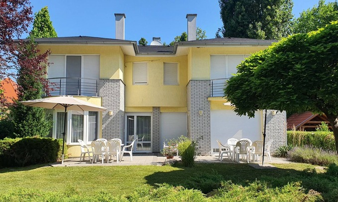 Szantod House | Holiday home only 80 m from private beach, with a small boat and air conditioning