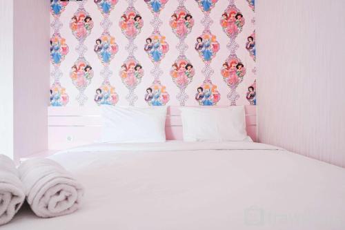 Rawasari Apartment | Homey and Fresh 2BR Green Pramuka Apartment By Travelio