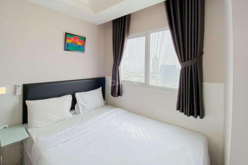 East Jakarta Apartment | Homey and Warm 2BR at Signature Park Grande Apartment By Travelio