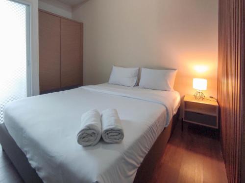 Sidoarjo Apartment | Homey Studio with Easy Pool Access Apartment at Suncity Residence By Travelio