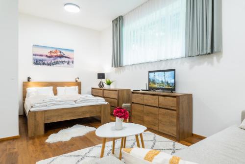 Vrchlabi Apartment | Horský apartmán v resortu se službami - WELLNESS DOČASNĚ MIMO PROVOZ