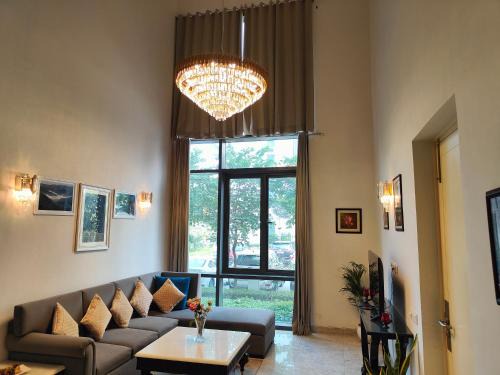 Sector 58 Apartment | Hostie Evanya - 2BHK Serviced Apartment near Golf Course Road
