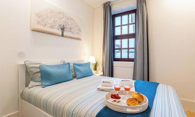 Guimaraes Apartment | HostWise - Modern Comfort in City Center