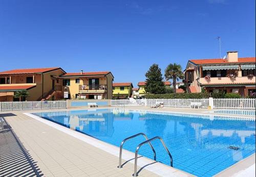 Caorle Apartment | HOTEL AQUA PARK RESORT VILLAGE EXCLUSIVE - The Family Rooms - Continental Breakfast - One day in our Water Park - One day Motorboat trip to explore the Caorle Lagoon - Parking inside