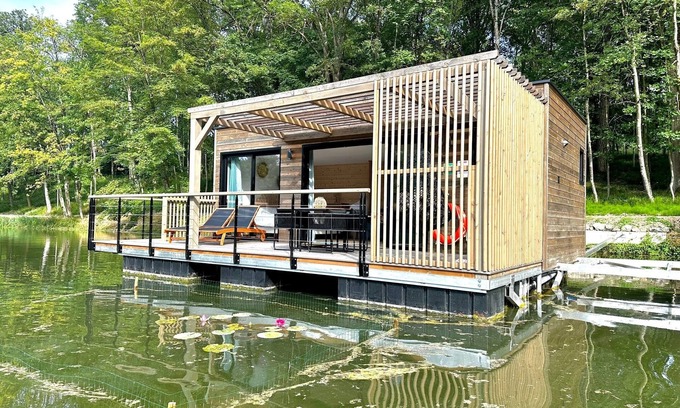 Sainte-Gemme Boat Rental | House Boat 'L'Othentique, Écolodge Flottant' with Lake View, Shared Garden and Air Conditioning