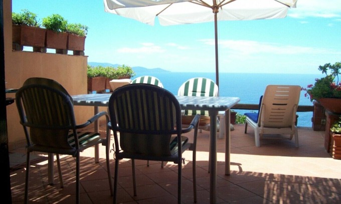 Cala Piccola Apartment | House with large terrace overlooking the sea, swimming pool, solarium, bathing establishment.