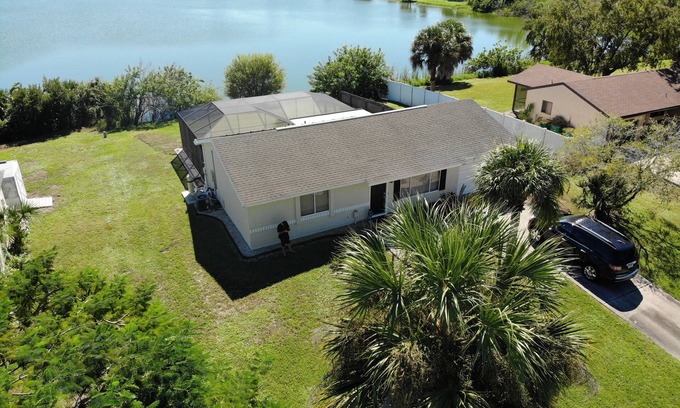 Port Charlotte House | House with solar heated pool and lake view!