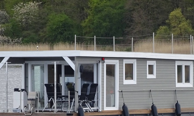 Luebeck Boat Rental | Houseboat Janne Lübeck Including canoe, SUP and WLAN 50 MBit s Flat