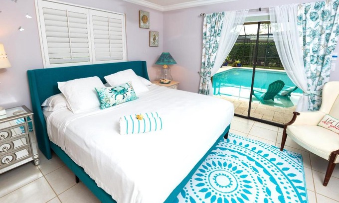 Kings Lake House | In the Heart of Naples, Suite with Lake & Pool