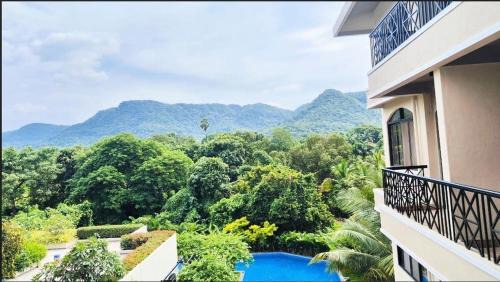 Alibaug Apartment | Inaara - Hill View & Pool view from Balcony